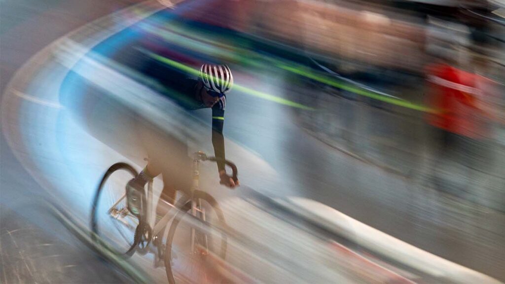 Fast bicycle rider in a blur - optimize your images so they load fast for faster page load times and better UX