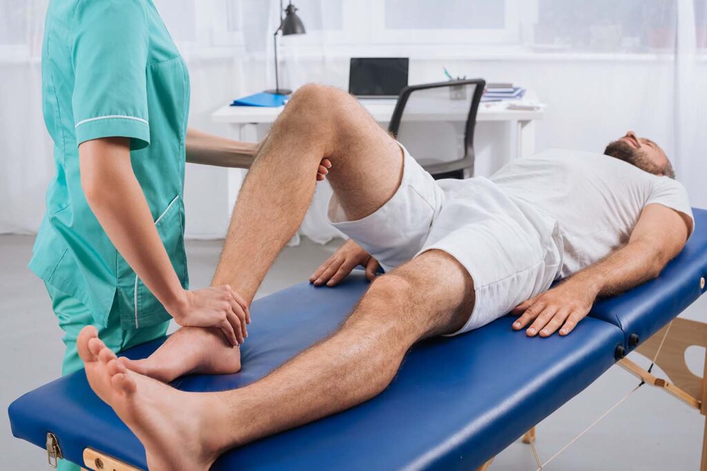 physical therapist works on a patient - physical therapy is one of the business industries that can benefit from SEO